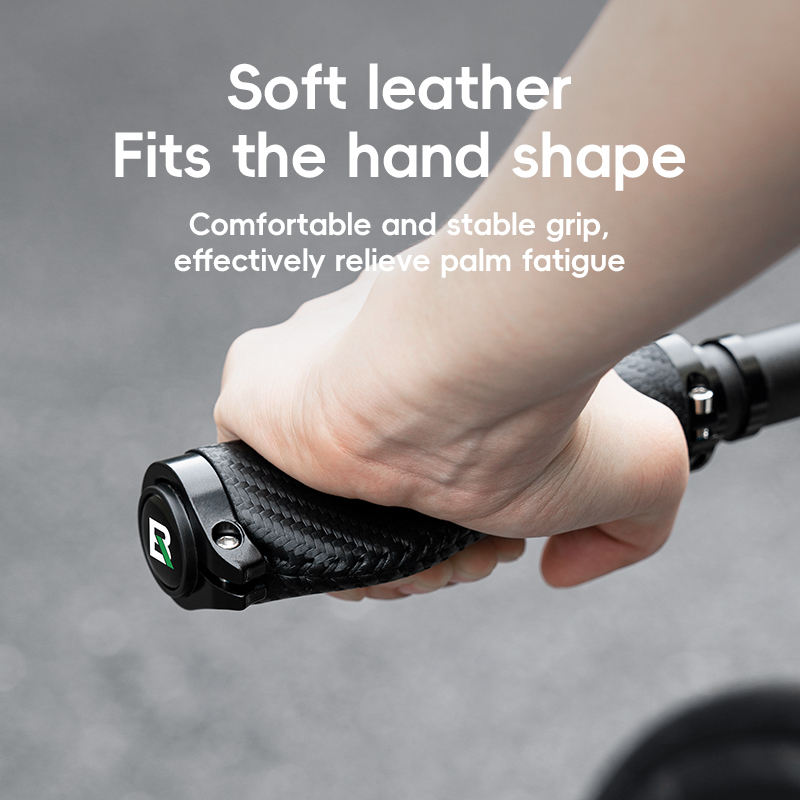 Hand holding a black handlebar grip with text about soft leather fit and comfort.