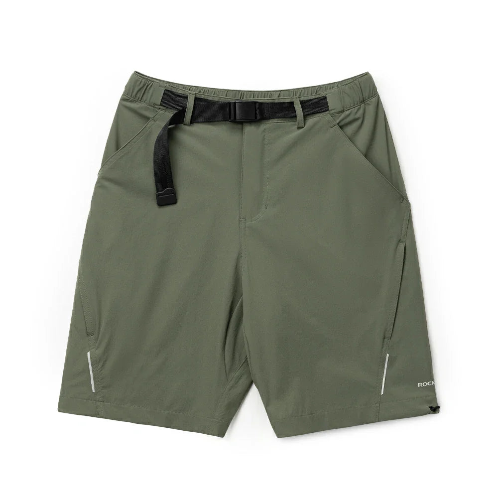 Green shorts with a black belt on a white background