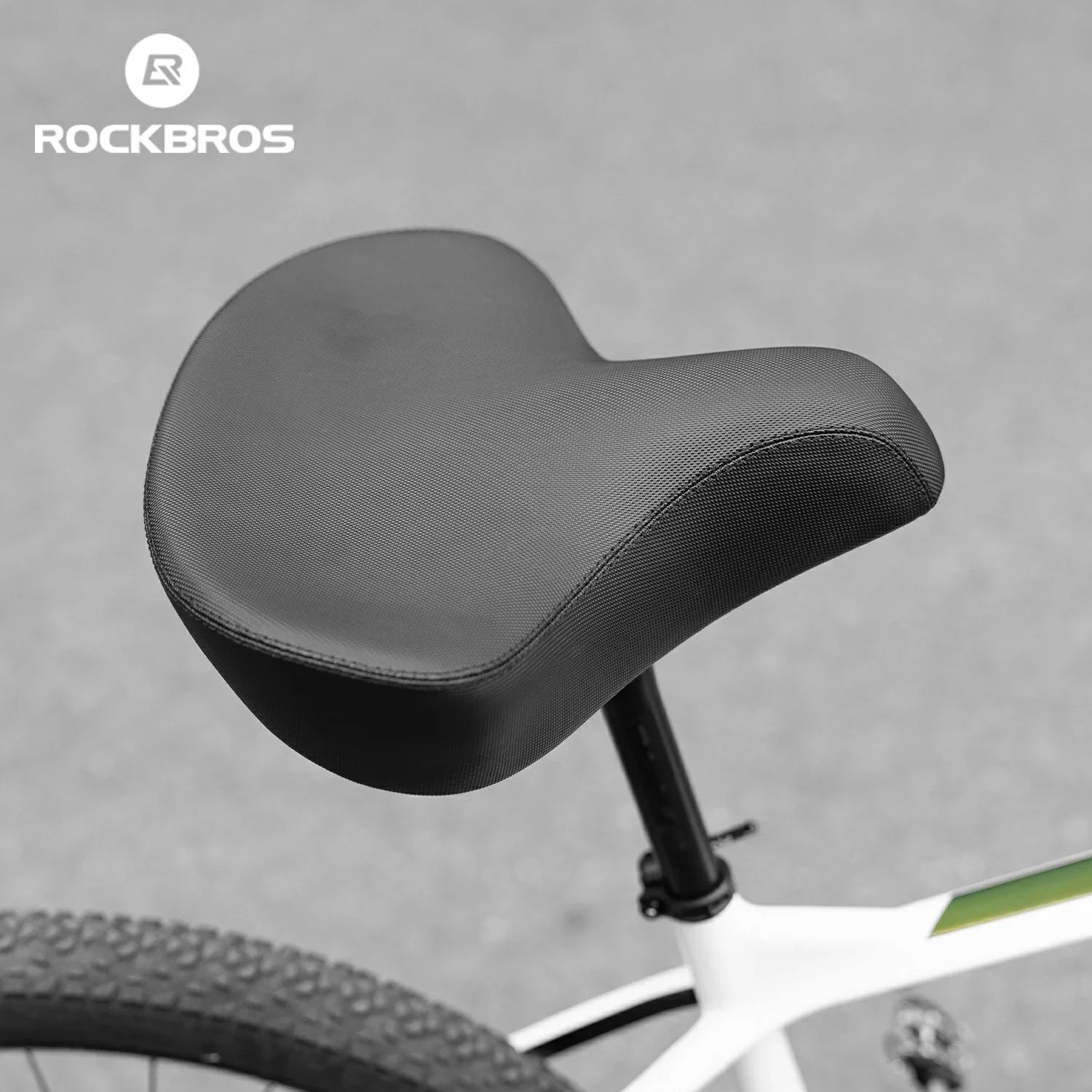 Close-up of a bicycle seat with 'RockBros' branding on a gray background
