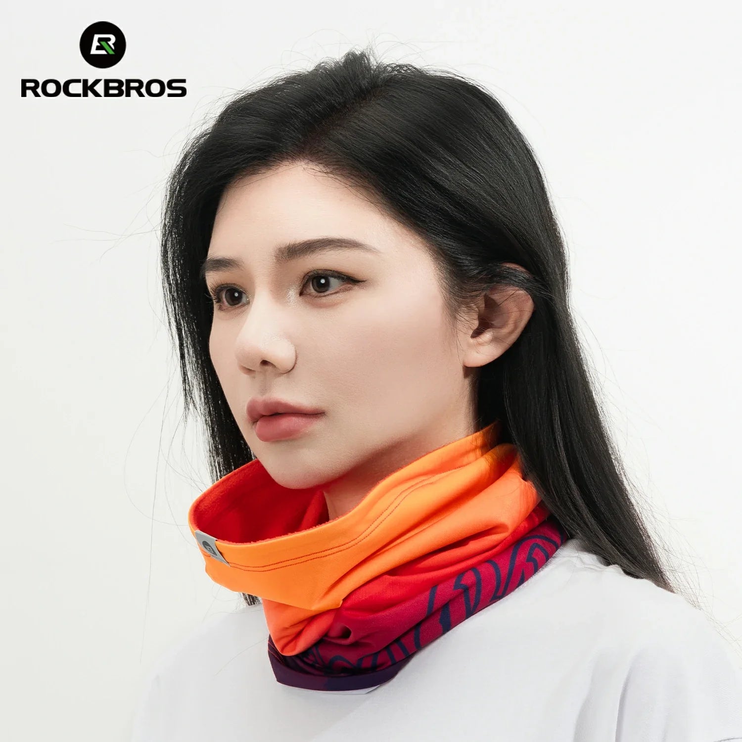 Person wearing a colorful neck gaiter with RockBros logo in the corner #Color_Orange