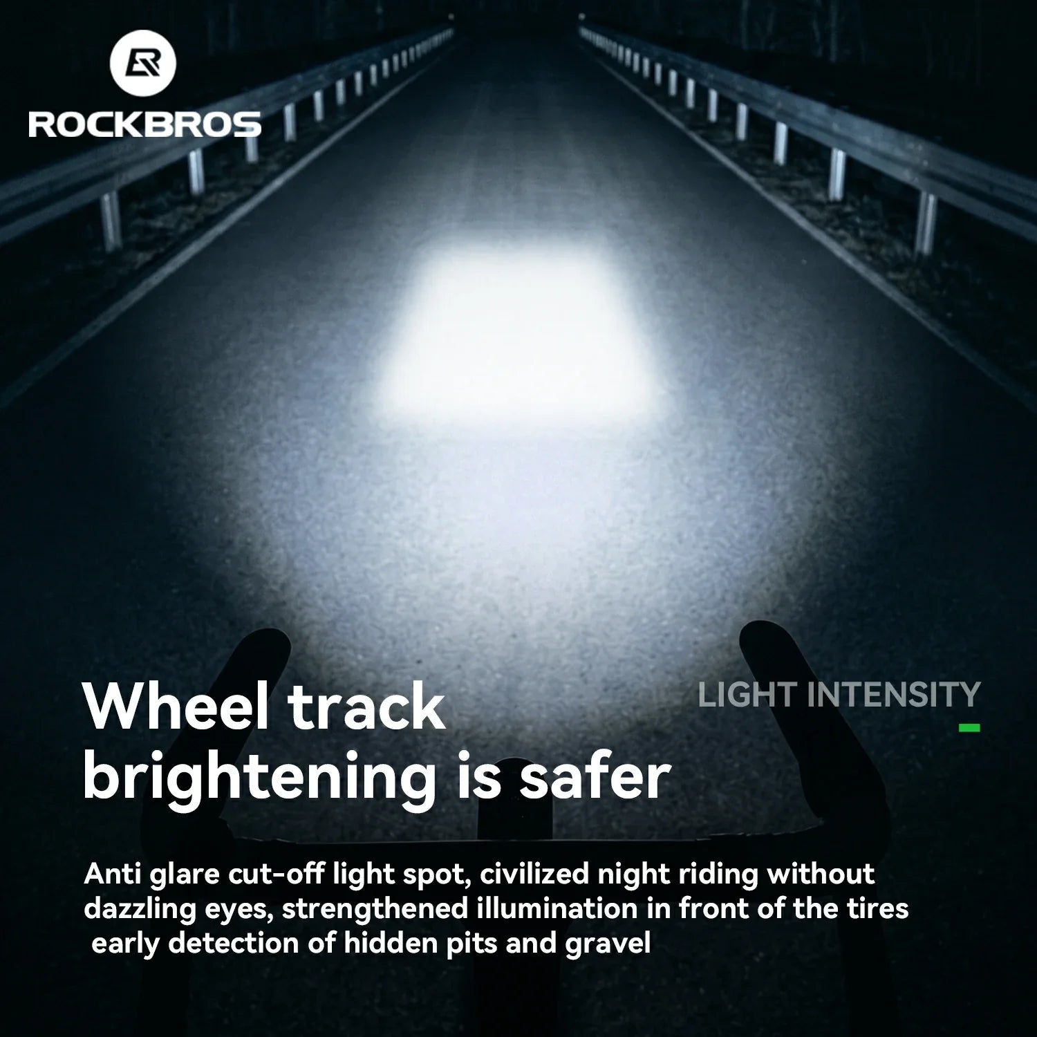 Rockbros promotional graphic showing a bright rectangular light beam cutting through a dark road at night, with the text 'Wheel track brightening is safer' and descriptive copy about anti glare cut-off light spot and tire illumination.