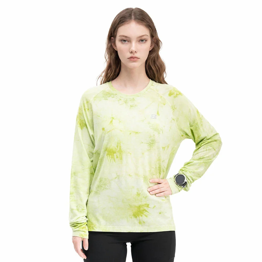 Model wearing a lime green long-sleeve running top
