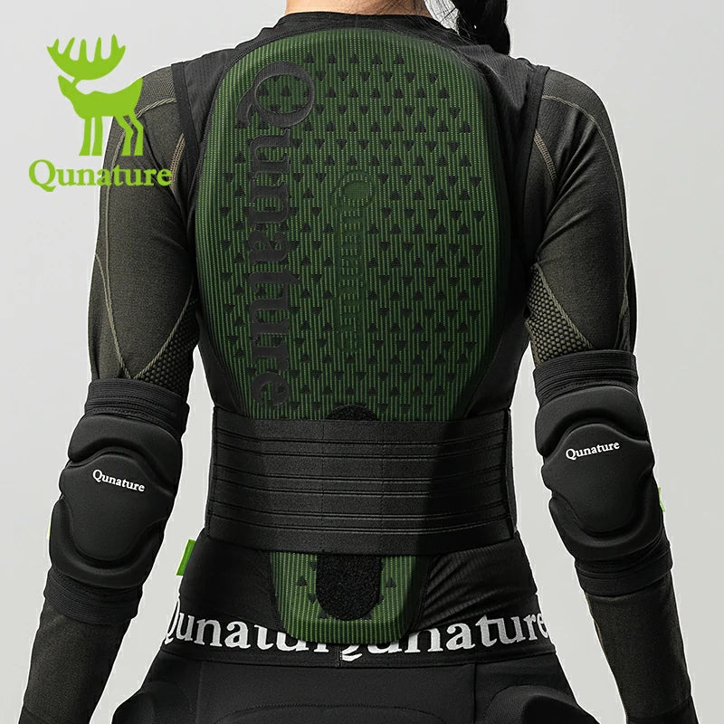 A woman wearing a pair of black elbow pads