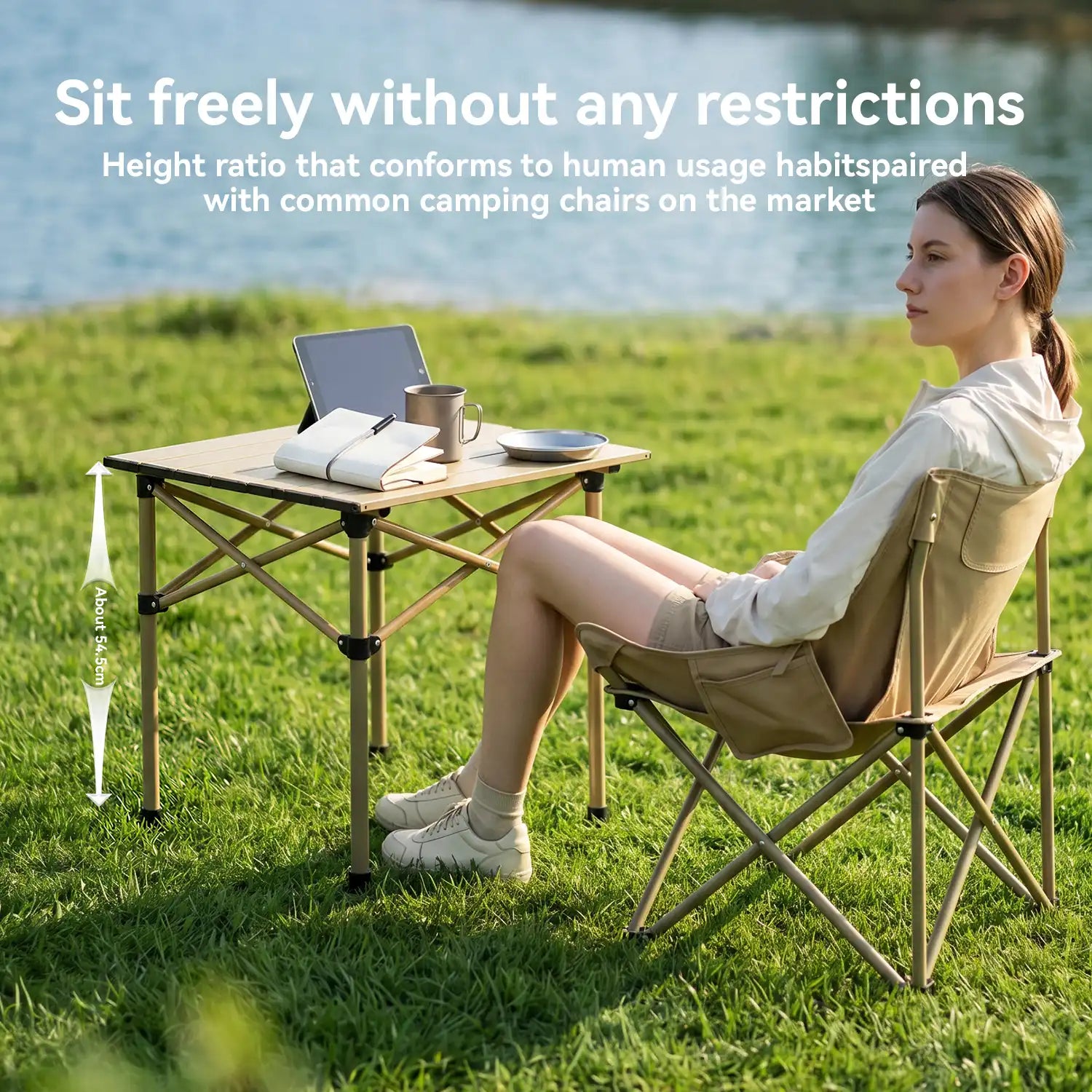 Woman sitting at a portable table and chair set in a grassy outdoor area with text about height ratio.