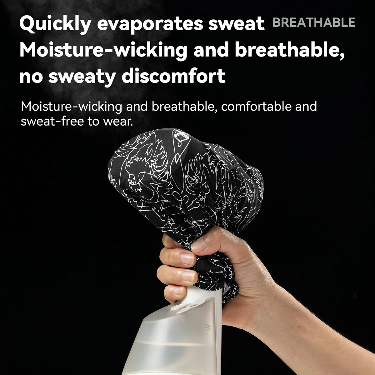 A hand holds a black and white patterned sweatshirt cover against a black background with promotional text about moisture-wicking and breathability. A spray bottle is shown at the bottom to demonstrate cooling effect.