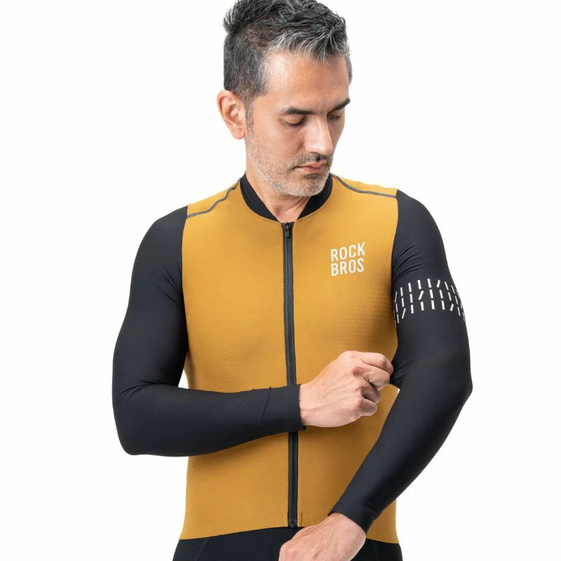 Man wearing a mustard yellow and black cycling jersey with 'Rock Bros' branding on a white background #color_Brown
