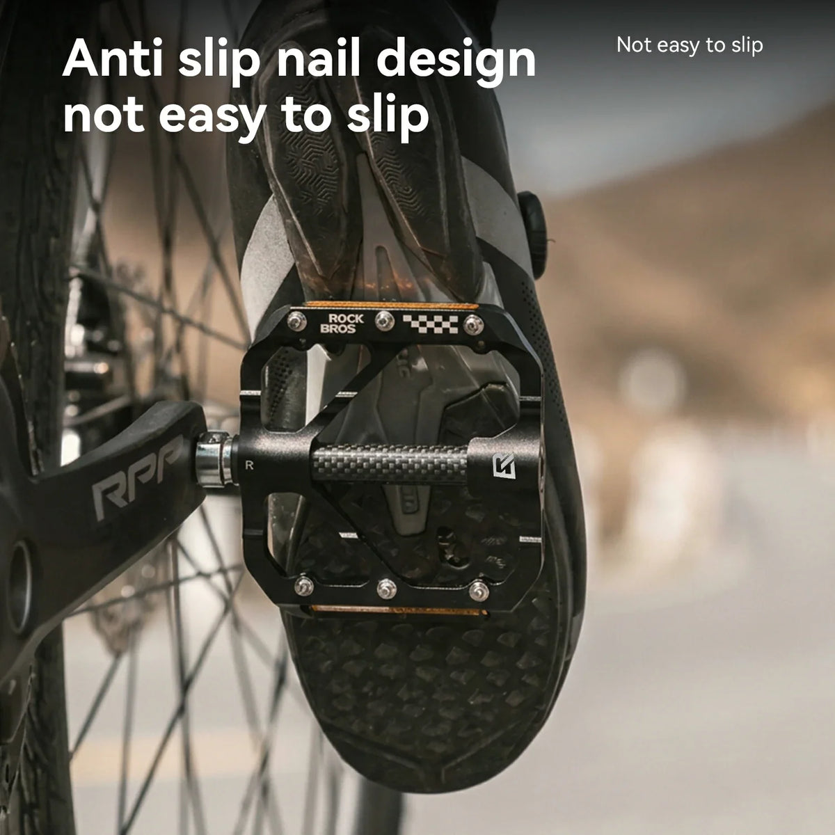 Anti-slip pins and textured grip surface on the pedal