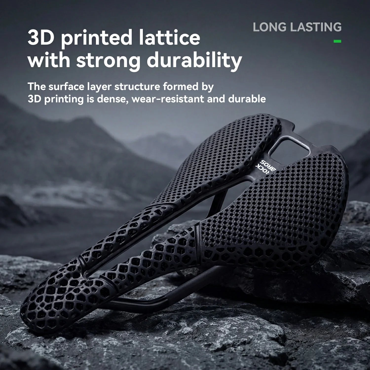 3D printed bicycle saddle on a rocky surface with mountainous background