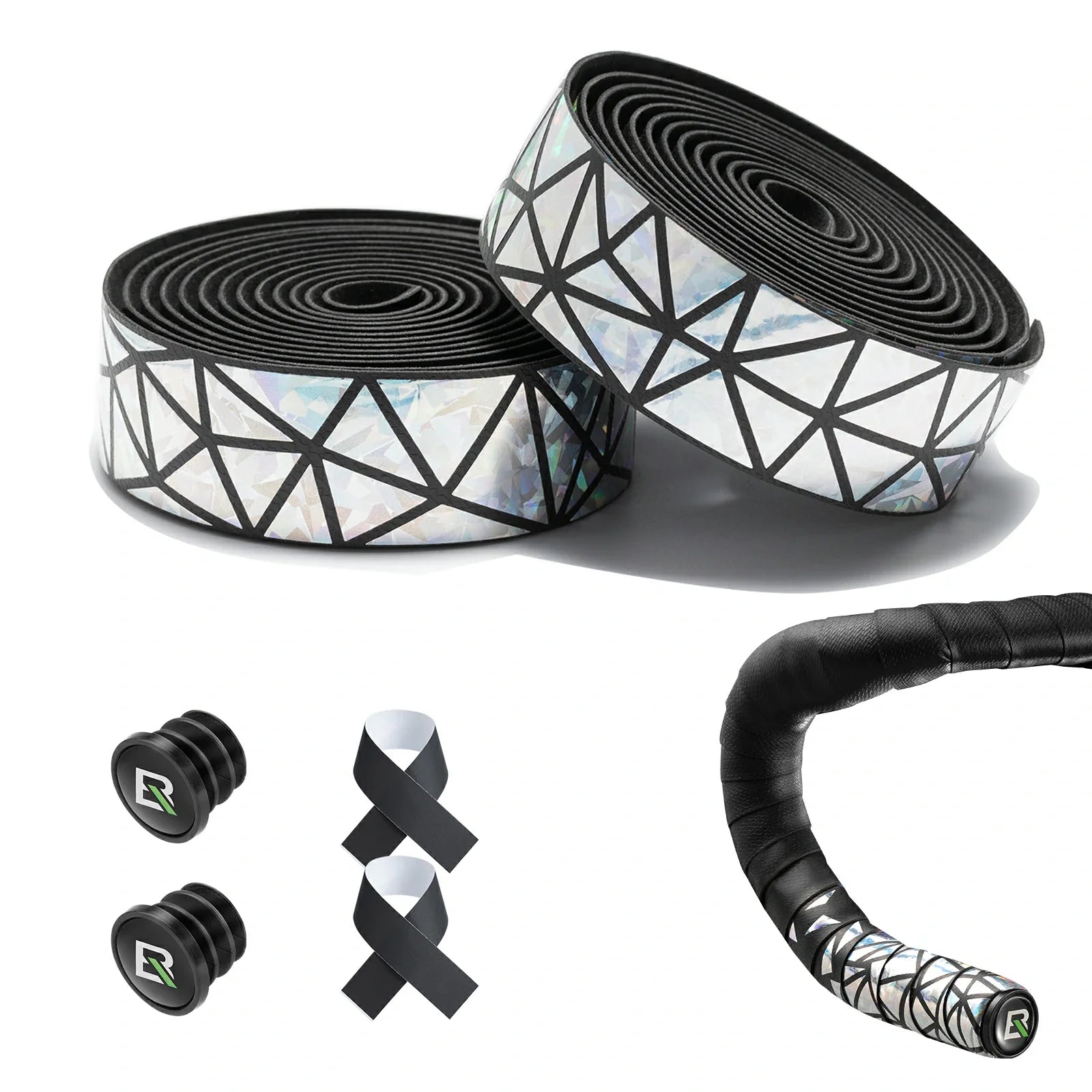 Bicycle handlebar tape and matching grips shown on a white background, including two rolls of black-and-white geometric tape, a wrapped handlebar section, two black grip plugs, and two black-and-white ribbons. #Color_Silver