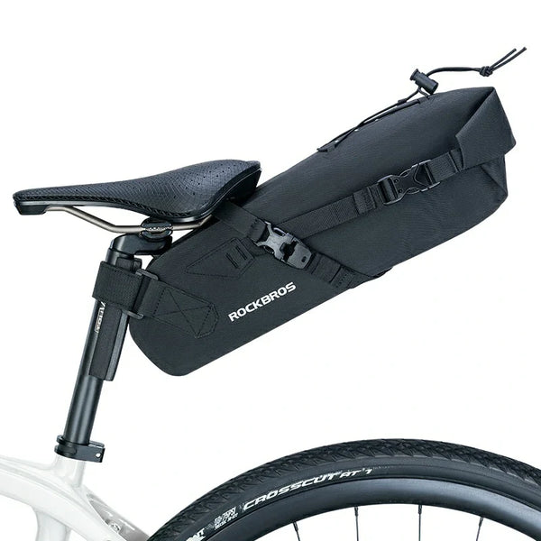 Black bicycle seat bag with 'RockBros' branding attached to a bike seat on a white background