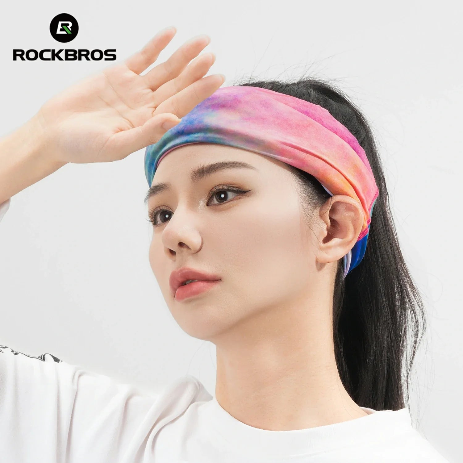 Woman wearing a colorful headband with 'RockBros' logo in the corner #Color_Pink