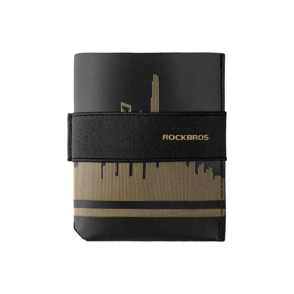 A black bifold wallet with a gold city skyline design and a black elastic band featuring the gold ROCKBROS logo, shown on a plain white background. #Color_Gold