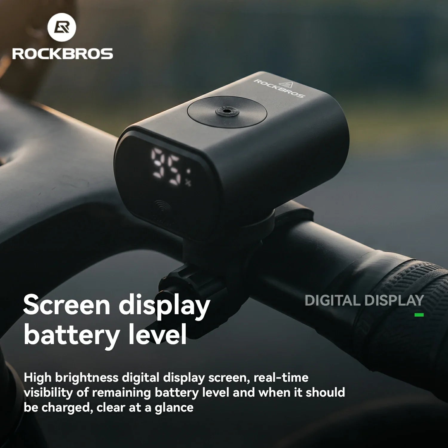 A black Rockbros digital battery display mounted on a bicycle handlebar, showing a bright 35% screen reading. The image includes promotional text highlighting the high-brightness digital display and features, with the Rockbros brand logo in the top left corner.