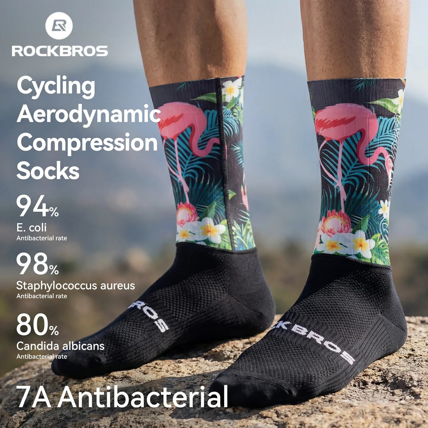 Cycling aerodynamic compression socks with flamingo design on a blurred natural background