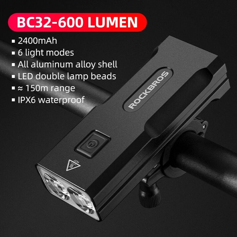 Black flashlight with features listed on a dark background #Size_600LM