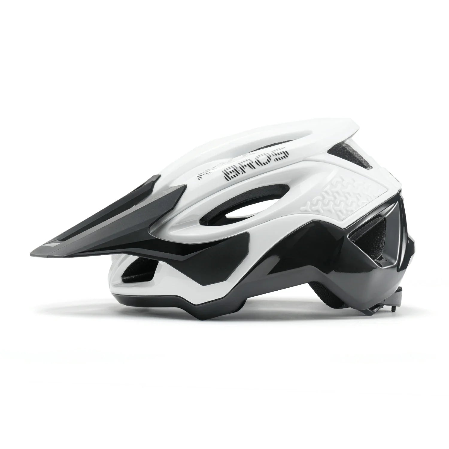A white and black mountain bike helmet with a prominent front shield, shown in a side profile on a clean white background.#Color_White