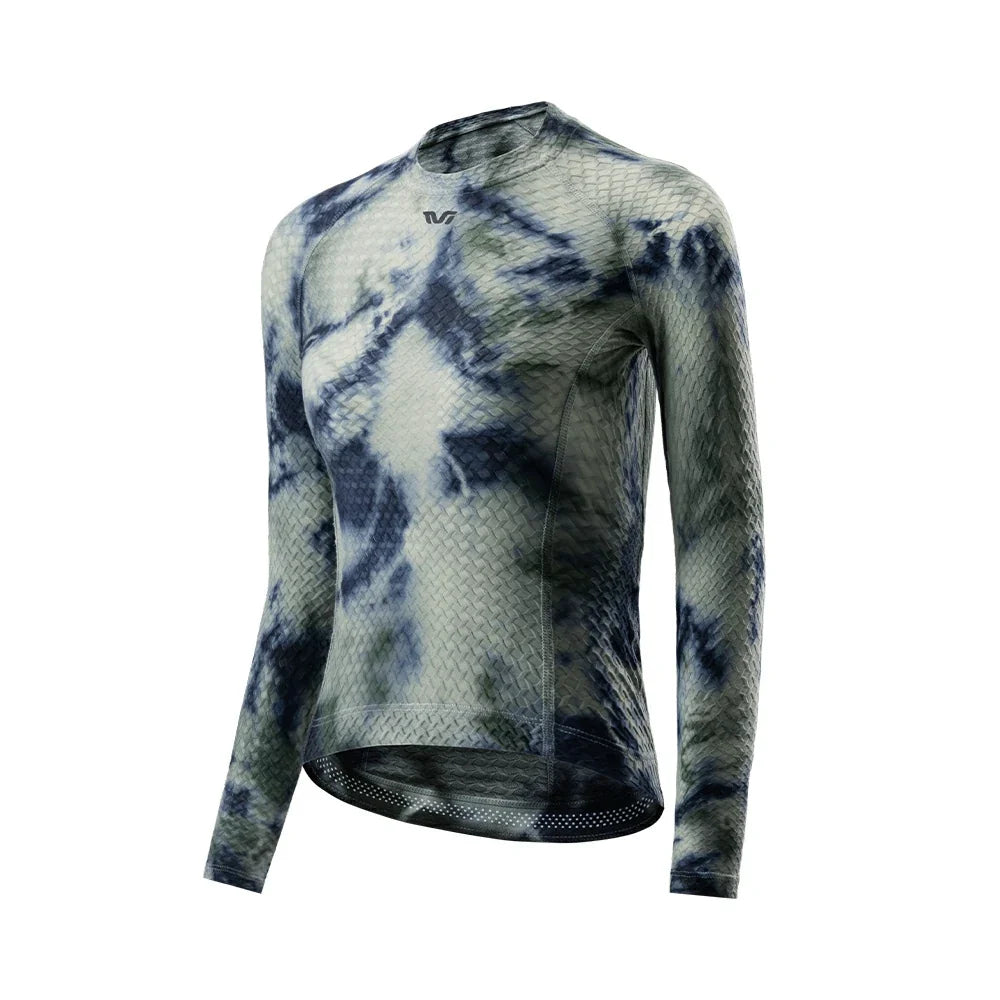 A long-sleeve athletic base layer top with a blue and gray tie-dye pattern, featuring a textured knit body and a high collar, shown on a plain white background. #Color_Gray