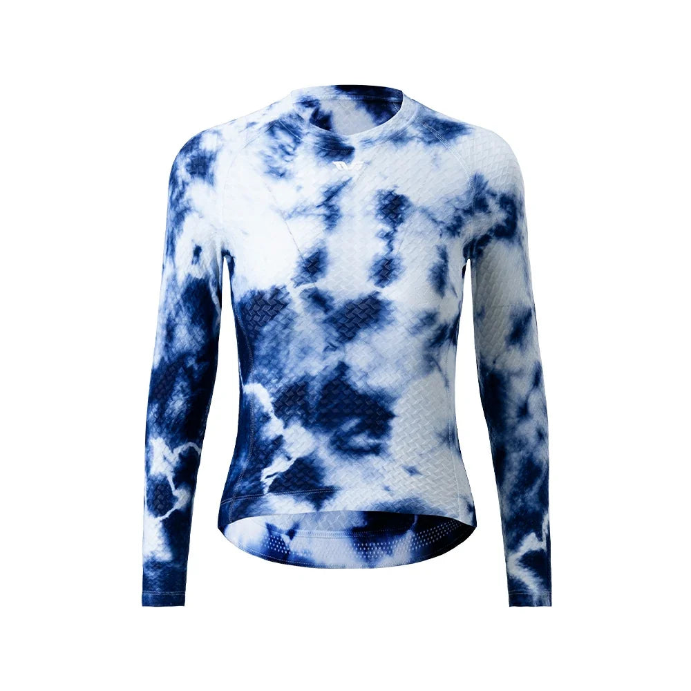 A long-sleeve athletic top with a blue and white tie-dye pattern, featuring a textured knit body and a breathable mesh V-neck collar, shown on a plain white background. #Color_White